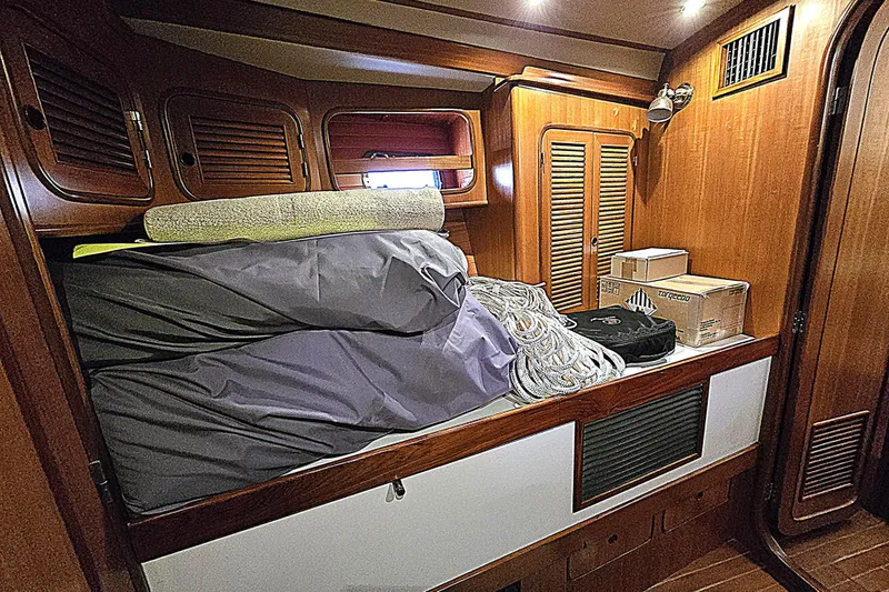 Slide: The Image of Interior of a 1992 Taswell 43 All Season yacht with storage space. - 16