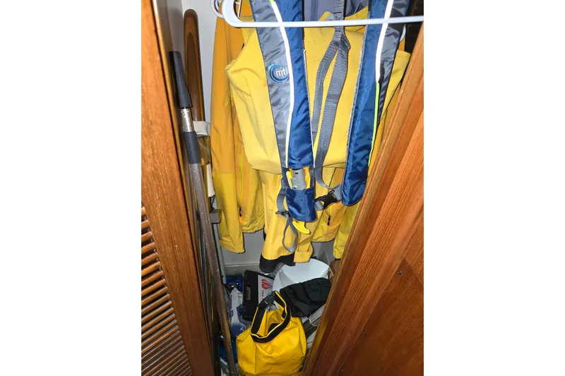 Slide: The Image of Sailing gear in the closet of a Taswell 43 All Season yacht. - 19