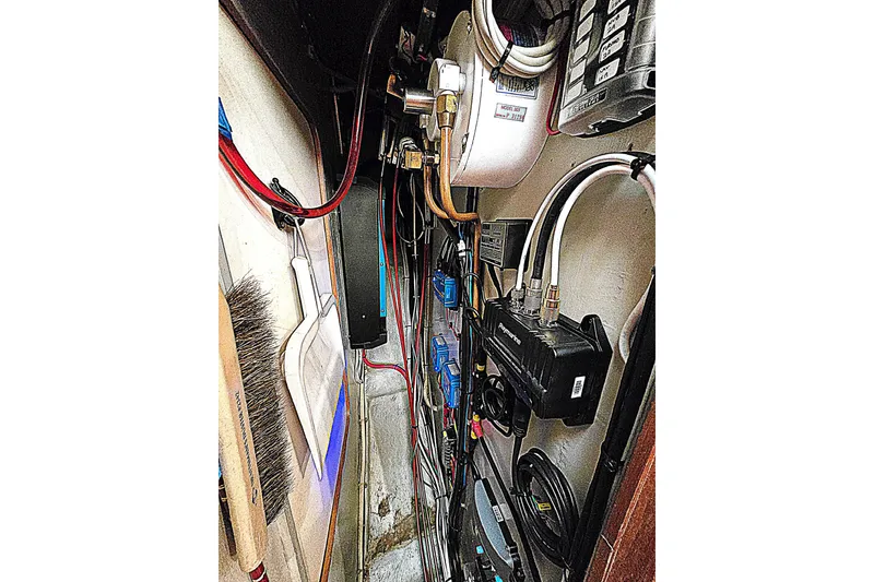 Slide: The Image of Taswell 43 All Season 1992 technical compartment with cables and equipment. - 24