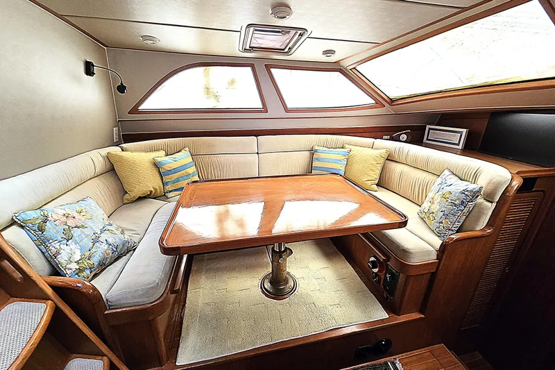 Slide: The Image of Luxurious interior of 1992 Taswell 43 All Season yacht with elegant seating and cushions. - 4