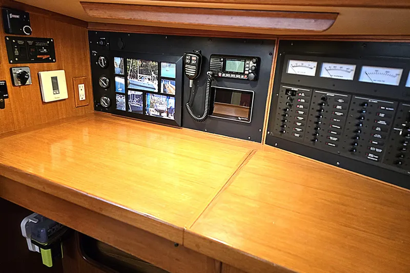Slide: The Image of 1992 Taswell 43 All Season yacht control panel with navigation and communication equipment. - 7