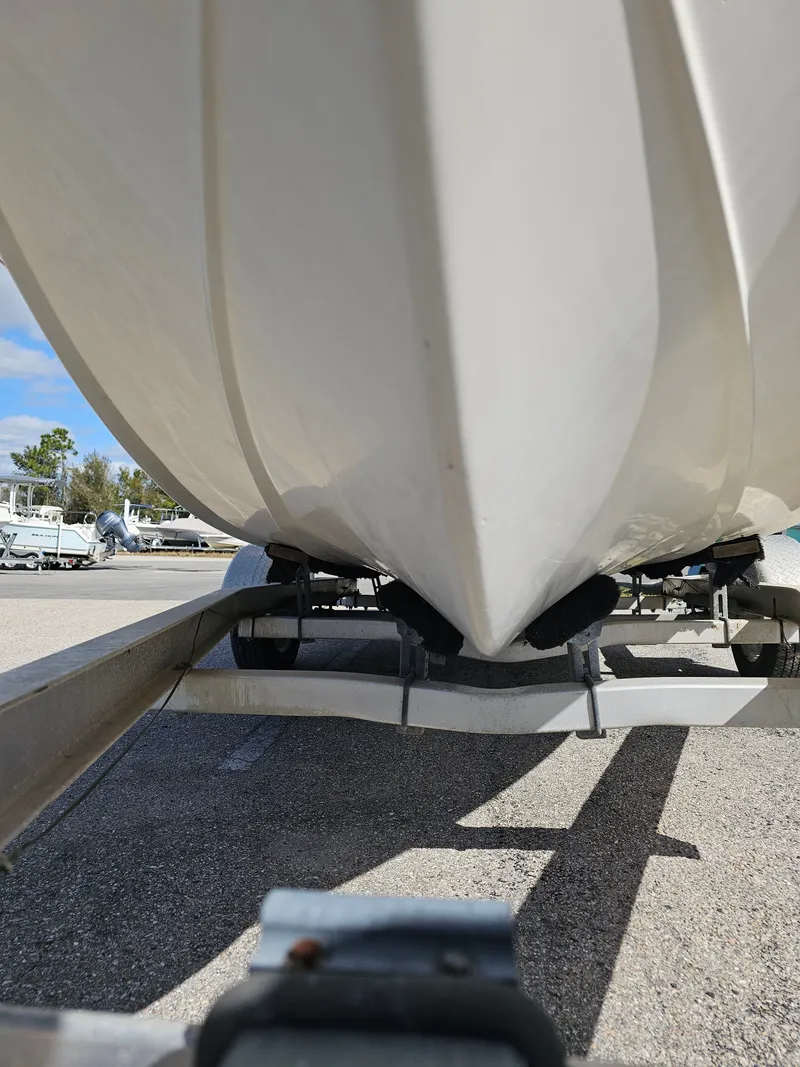 Slide: The Image of Underside of a Sea Fox 195 Bay Fisher boat on trailer. - 15