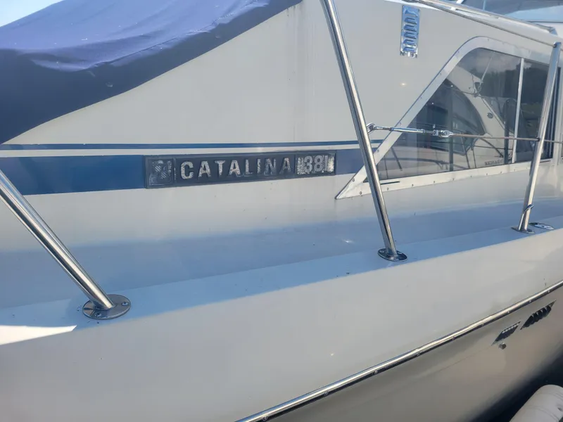 Slide: The Image of 1986 Chris-Craft 381 Catalina boat with blue cover and chrome railings. - 4
