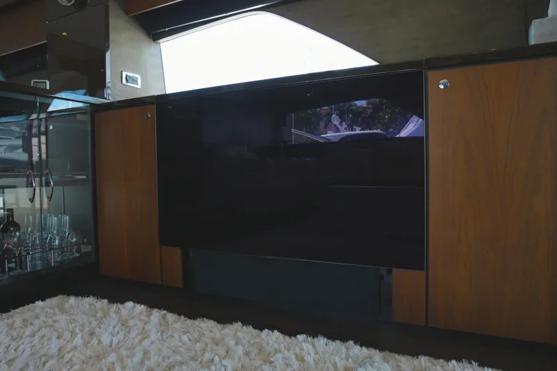Slide: The Image of Luxurious interior of 2014 Fairline Squadron 78 Custom yacht with elegant wood cabinetry. - 12