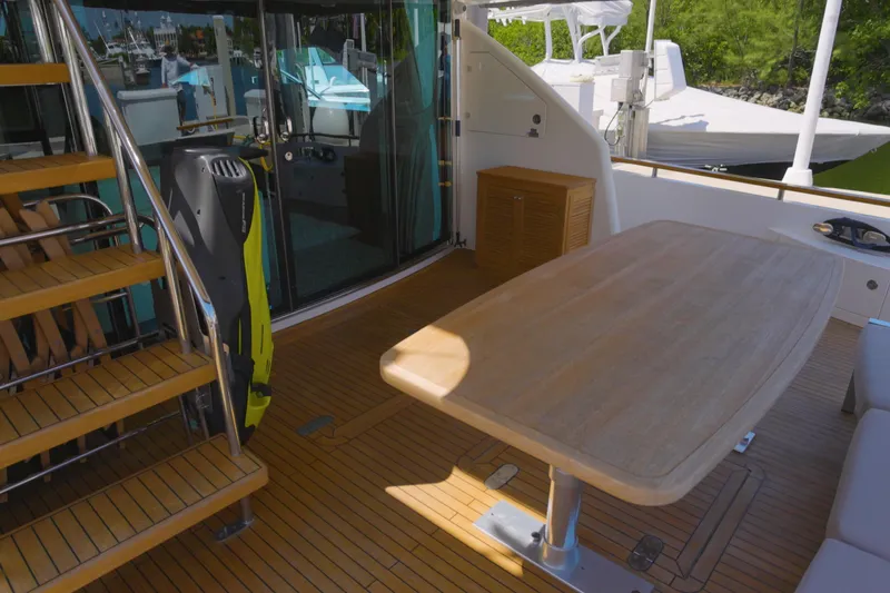 Slide: The Image of Luxury yacht Fairline Squadron 78 Custom 2014, featuring elegant teak deck and outdoor dining area. - 15