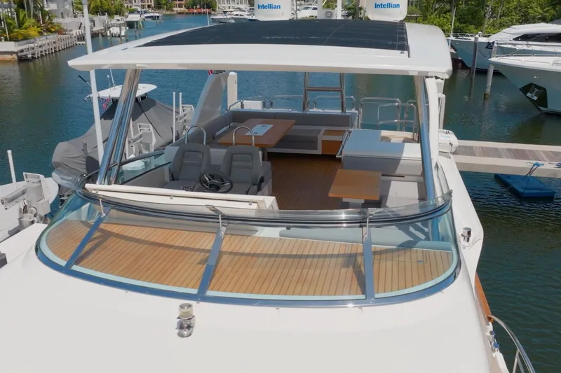 Slide: The Image of 2014 Fairline Squadron 78 Custom yacht with spacious deck and modern seating. - 16