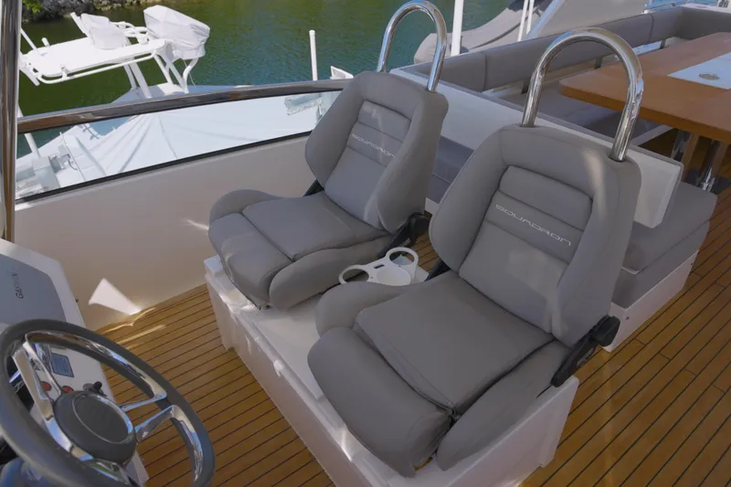 Slide: The Image of Luxury seating on 2014 Fairline Squadron 78 Custom yacht, featuring elegant design and comfort. - 21
