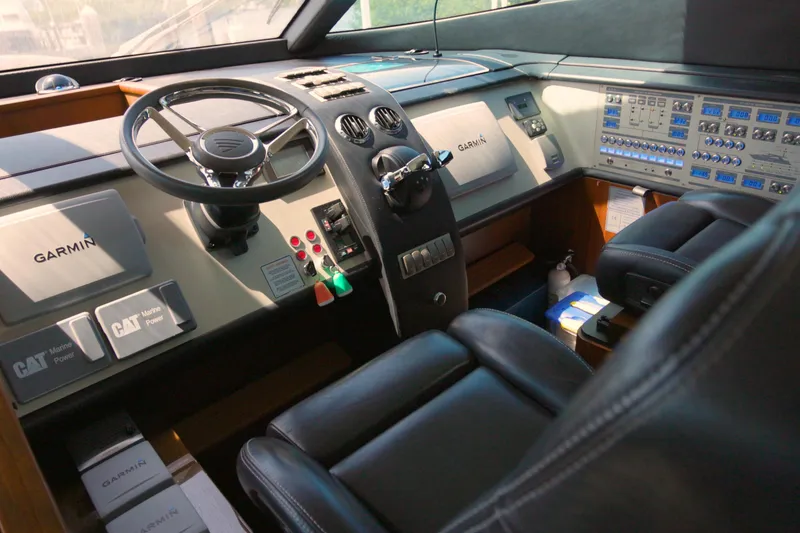 Slide: The Image of Cockpit of 2014 Fairline Squadron 78 Custom yacht with Garmin navigation system. - 6