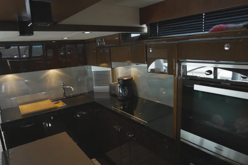 Slide: The Image of Luxurious kitchen interior of 2014 Fairline Squadron 78 Custom yacht, featuring modern appliances. - 7