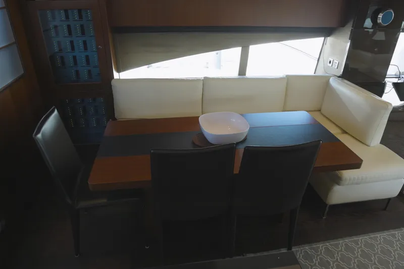 Slide: The Image of Interior dining area of 2014 Fairline Squadron 78 Custom yacht with modern seating and table. - 9