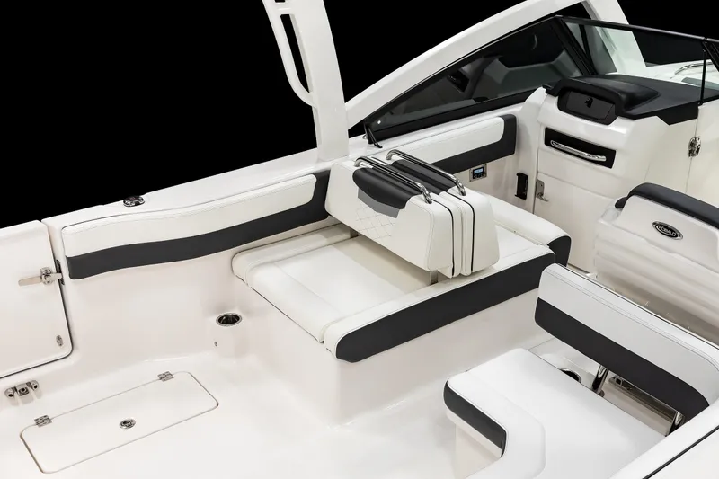 Slide: The Image of 2026 Robalo R277 Dual Console boat interior with sleek seating and modern design. - 13