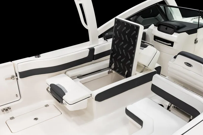 Slide: The Image of 2026 Robalo R277 Dual Console boat interior with sleek seating and storage features. - 15