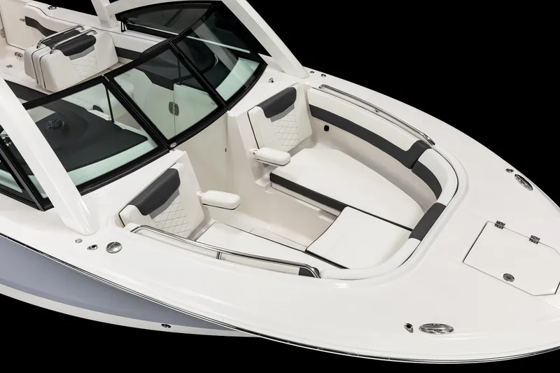 Slide: The Image of 2026 Robalo R277 Dual Console boat interior with sleek seating and modern design. - 3