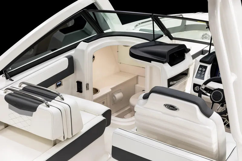 Slide: The Image of 2026 Robalo R277 Dual Console interior with sleek seating and modern dashboard design. - 8