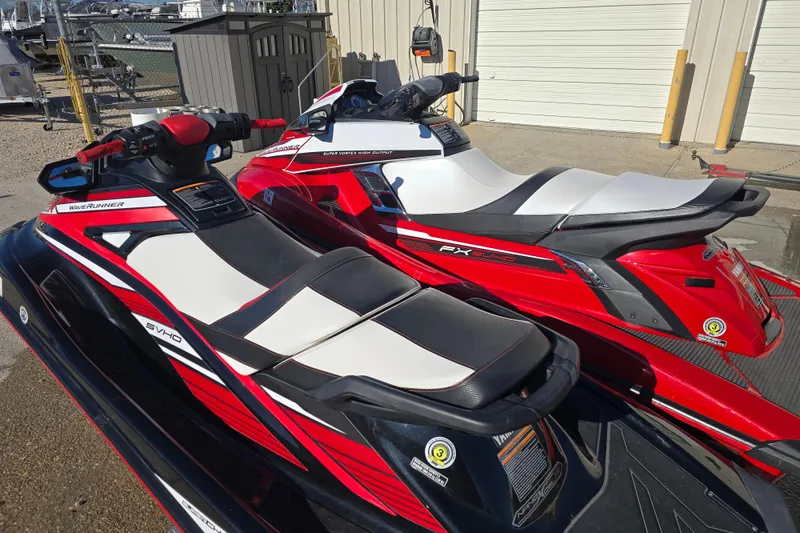Slide: The Image of 2019 Yamaha WaveRunner GP1800R SVHO jet skis in vibrant red and white. - 9