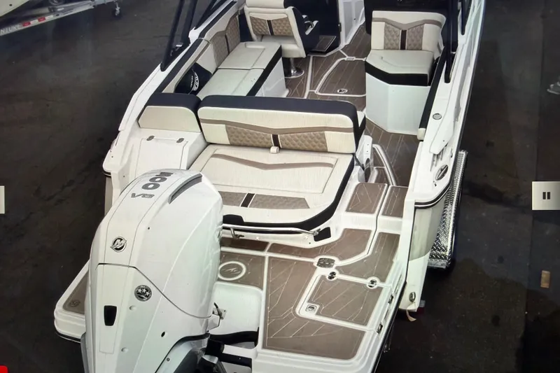 Slide: The Image of 2024 Monterey 255SS Super Sport boat interior with seating and outboard motor. - 5