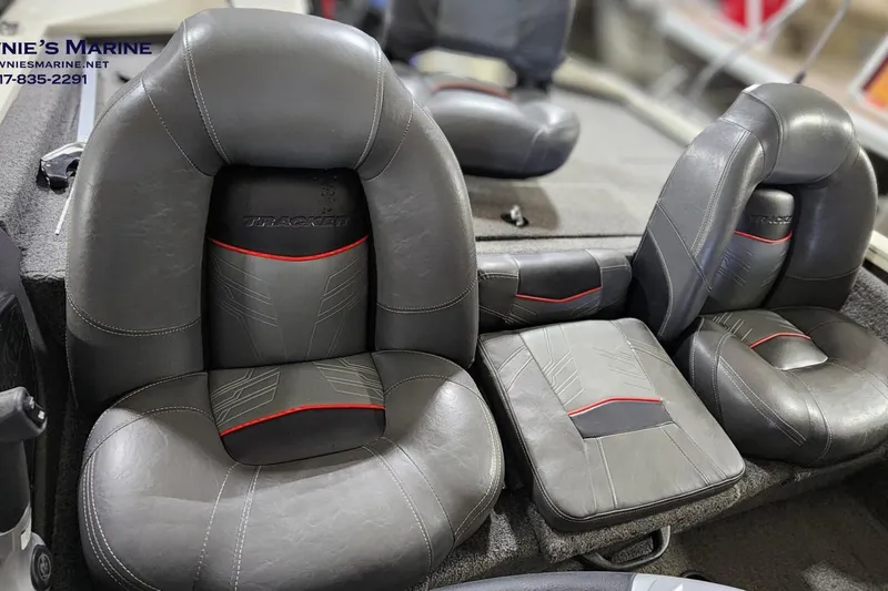 Slide: The Image of 2021 Tracker Pro Team 190 TX Tournament Edition boat seats, black with red accents. - 15