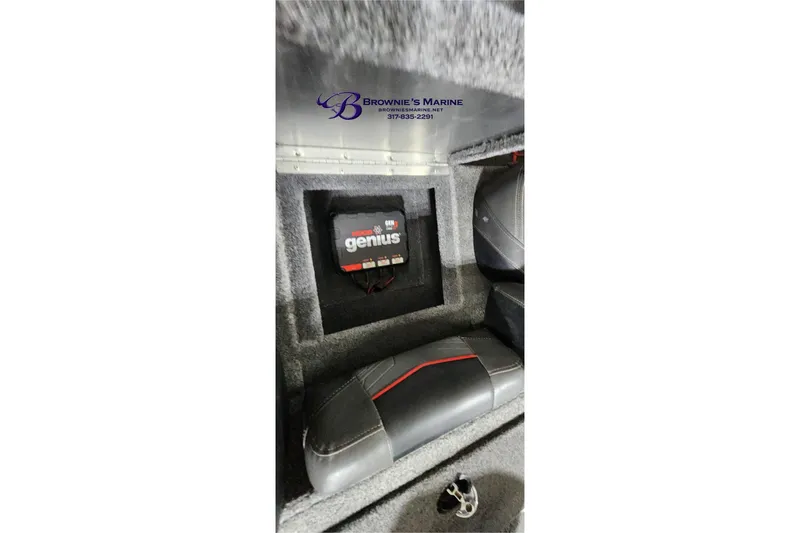 Slide: The Image of 2021 Tracker Pro Team 190 TX Tournament Edition boat interior with Genius battery charger. - 17