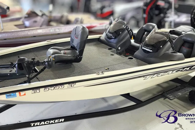 Slide: The Image of 2021 Tracker Pro Team 190 TX Tournament Edition boat on display in showroom. - 4