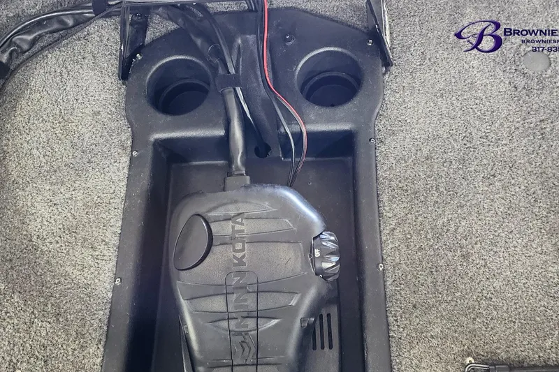 Slide: The Image of 2021 Tracker Pro Team 190 TX Tournament Edition boat foot pedal and cup holders. - 8