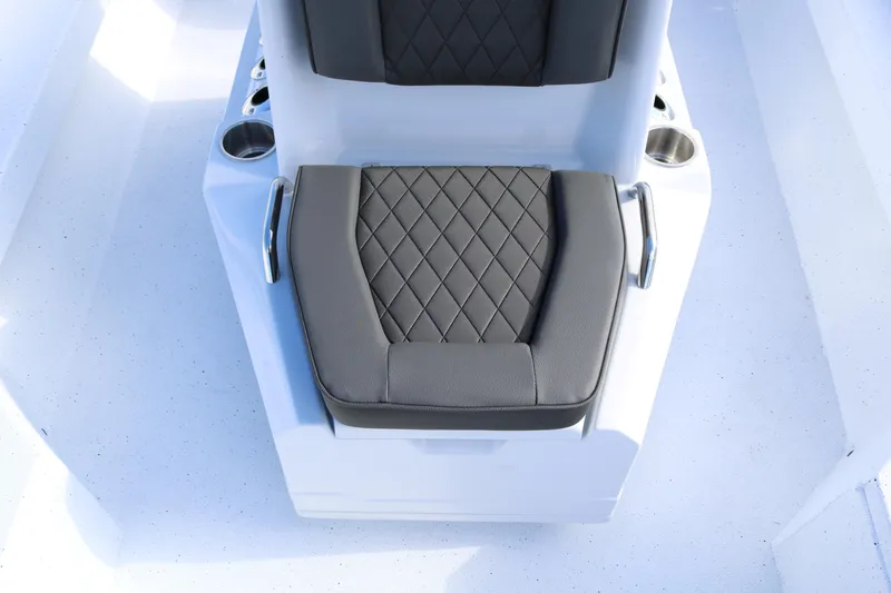 Slide: The Image of 2026 Xpress H20B Bay boat seat with diamond-stitched upholstery and cup holders. - 33
