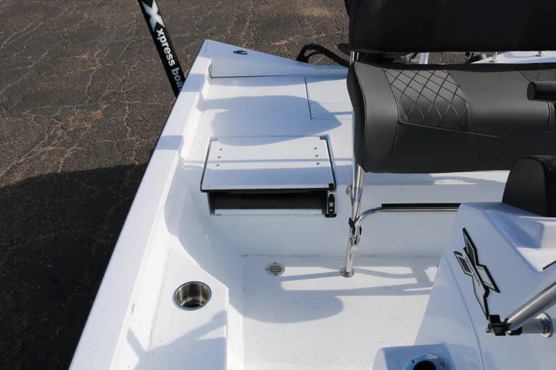 Slide: The Image of 2026 Xpress H20B Bay boat interior with seating and storage features. - 35