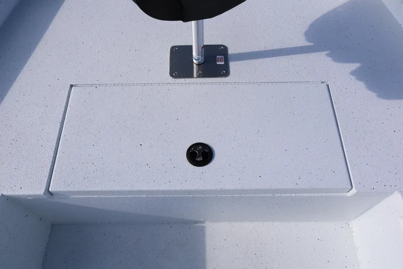 Slide: The Image of 2026 Xpress H20B Bay boat deck with seat mount and storage compartment. - 40