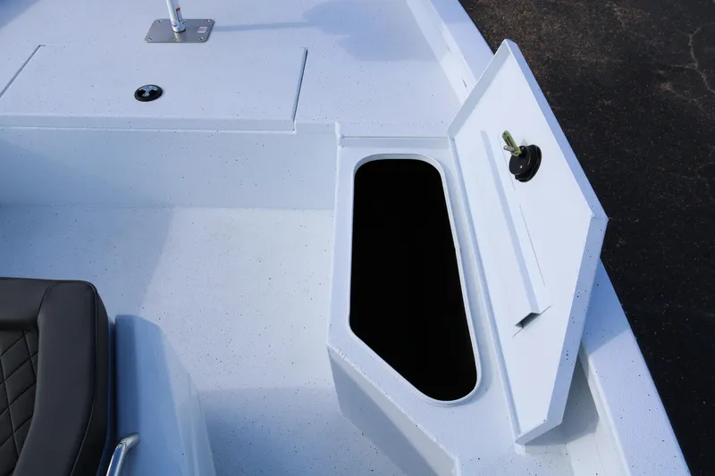Slide: The Image of 2026 Xpress H20B Bay boat with open storage compartment on deck. - 8