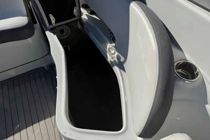 Slide: The Image of 2019 Crownline Eclipse E255 XS boat interior storage compartment. - 12