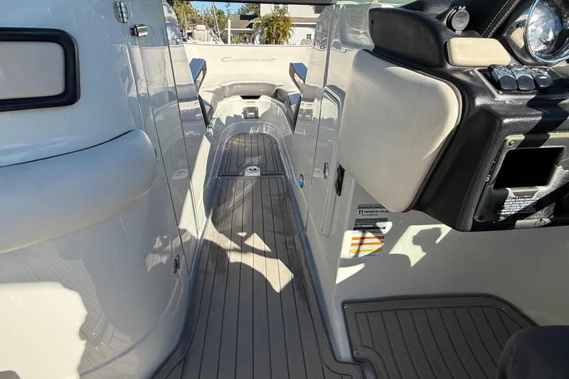 Slide: The Image of 2019 Crownline Eclipse E255 XS boat interior with sleek design and modern dashboard. - 33