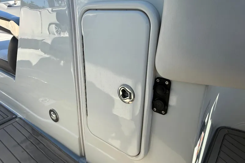 Slide: The Image of 2019 Crownline Eclipse E255 XS boat storage compartment with sleek design and modern features. - 34