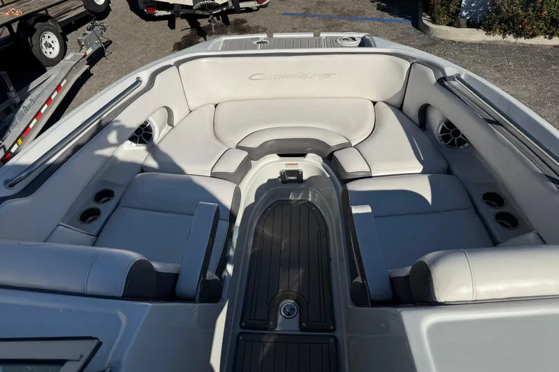 Slide: The Image of 2019 Crownline Eclipse E255 XS boat interior with spacious seating and cup holders. - 35