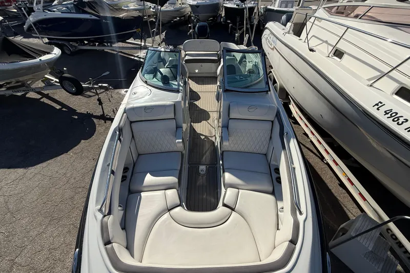 Slide: The Image of 2019 Crownline Eclipse E255 XS boat with spacious seating and sleek design. - 40