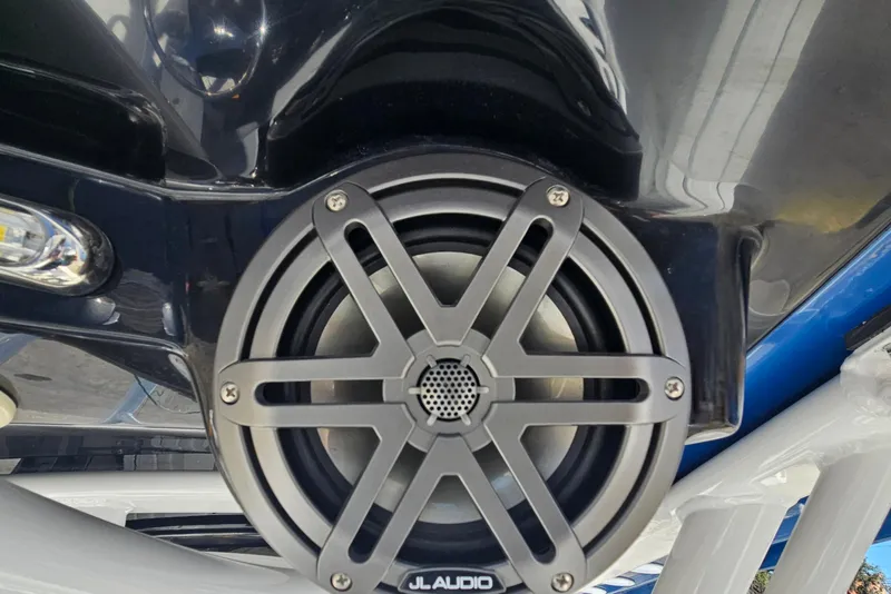 Slide: The Image of JL Audio speaker on 2021 Wellcraft 242 Fisherman boat, close-up view. - 19