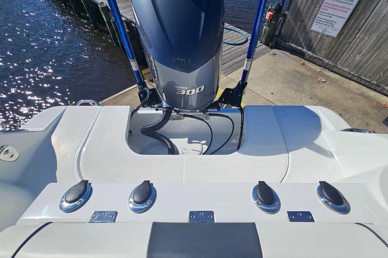 Slide: The Image of 2021 Wellcraft 242 Fisherman boat with Yamaha 300 engine at dockside. - 20