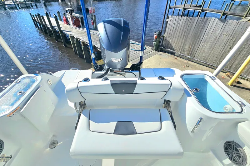 Slide: The Image of 2021 Wellcraft 242 Fisherman boat with Yamaha 300 engine at dockside. - 9