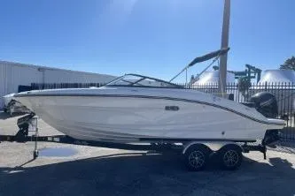 Slide: The Image of 2024 Sea Ray SPX 210 Outboard boat on trailer, side view, sunny day. - 5