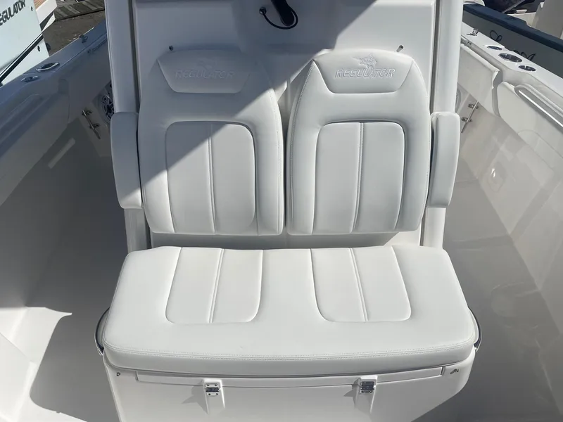 Slide: The Image of White seating on a 2025 Regulator 31 boat. - 16