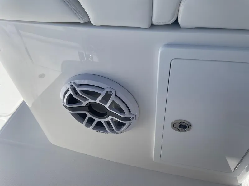 Slide: The Image of Speaker and storage on Regulator 31 boat, year 2025. - 20