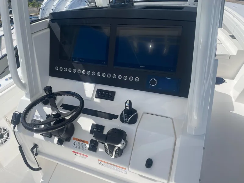 Slide: The Image of Control console of the 2025 Regulator 31 boat model. - 21