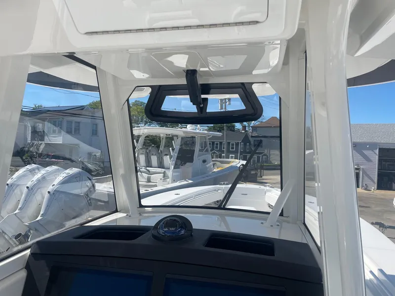 Slide: The Image of Interior view of a 2025 Regulator 31 boat with modern features. - 23