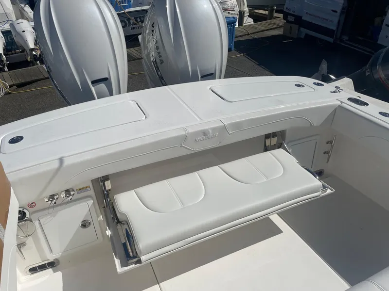 Slide: The Image of 2025 Regulator 31 boat with foldable seat and engines. - 30