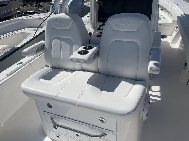 Slide: The Image of Luxurious seating in the 2025 Regulator 31 boat. - 32