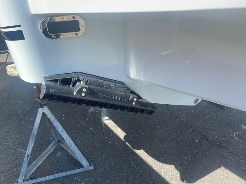 Slide: The Image of Stern of a 2025 Regulator 31 boat on a stand. - 4