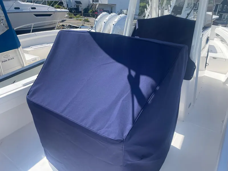 Slide: The Image of Covered helm station on a 2025 Regulator 31 boat. - 7