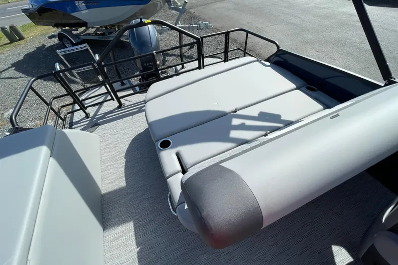 Slide: The Image of 2026 Starcraft EXS 1 Q DH boat with spacious seating and sleek design. - 15