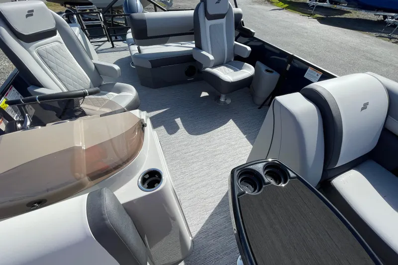 Slide: The Image of 2026 Starcraft EXS 1 Q DH boat interior with modern seating and sleek design. - 8