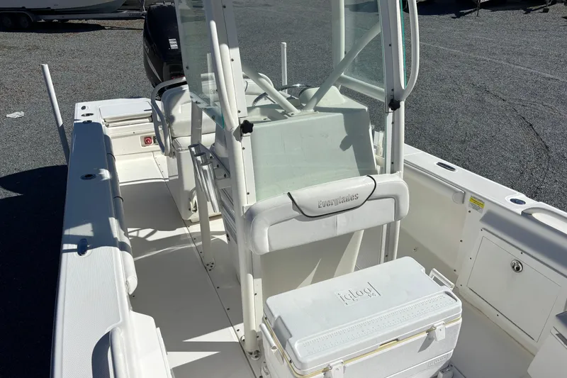 Slide: The Image of 2008 Everglades 243 Center Console boat interior with seating and storage. - 16