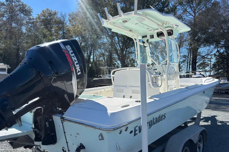 Slide: The Image of 2008 Everglades 243 Center Console boat with Suzuki engine on trailer. - 3