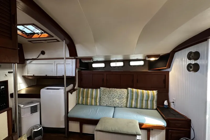 Slide: The Image of Interior of 1975 Morgan Out Island 51 yacht with cozy seating and modern amenities. - 17